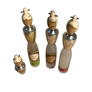 3 decorative Japanese liquor bottles depicting women